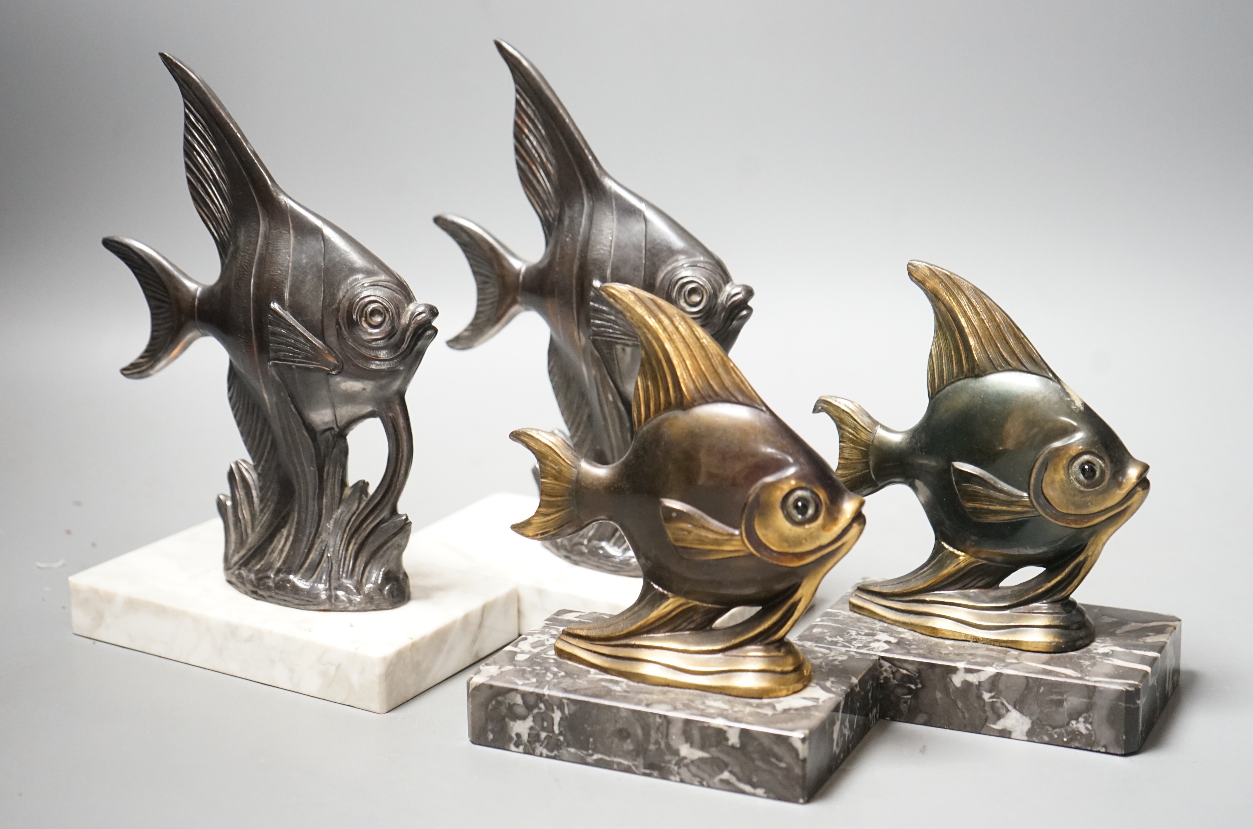 Two pairs of Art Deco spelter 'Angel fish' bookends. Tallest pair 20cm